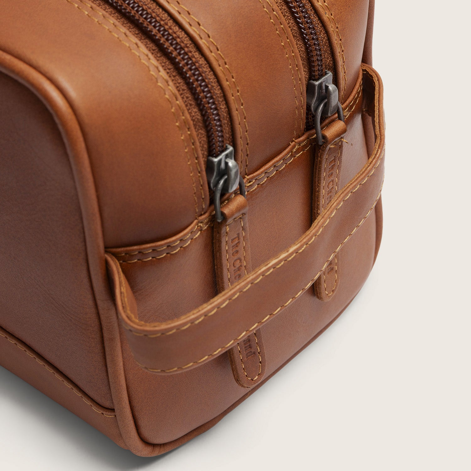 Leder Kulturtasche Cognac Stacey, Nahaufnahme des Griffs