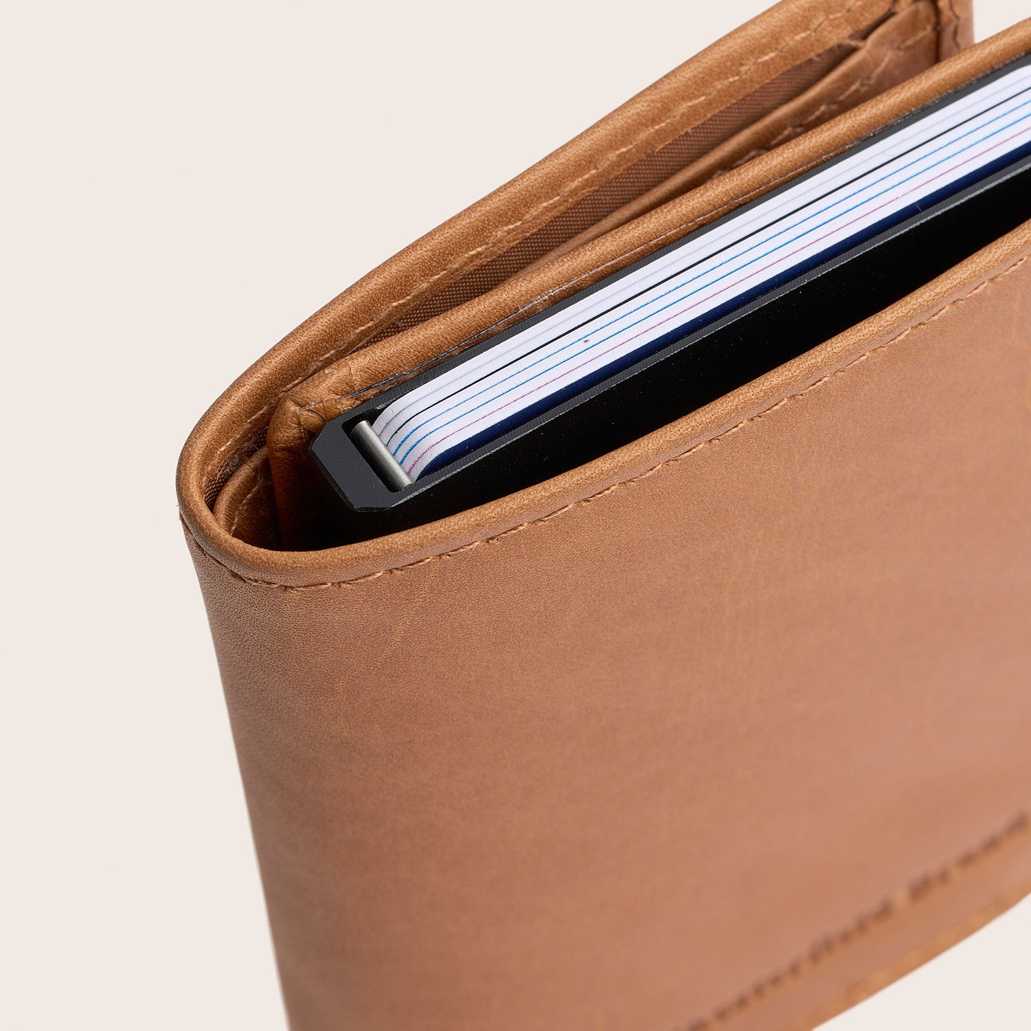 Leather Card Holder Cognac Lancaster, close-up of the top with cards in the card case