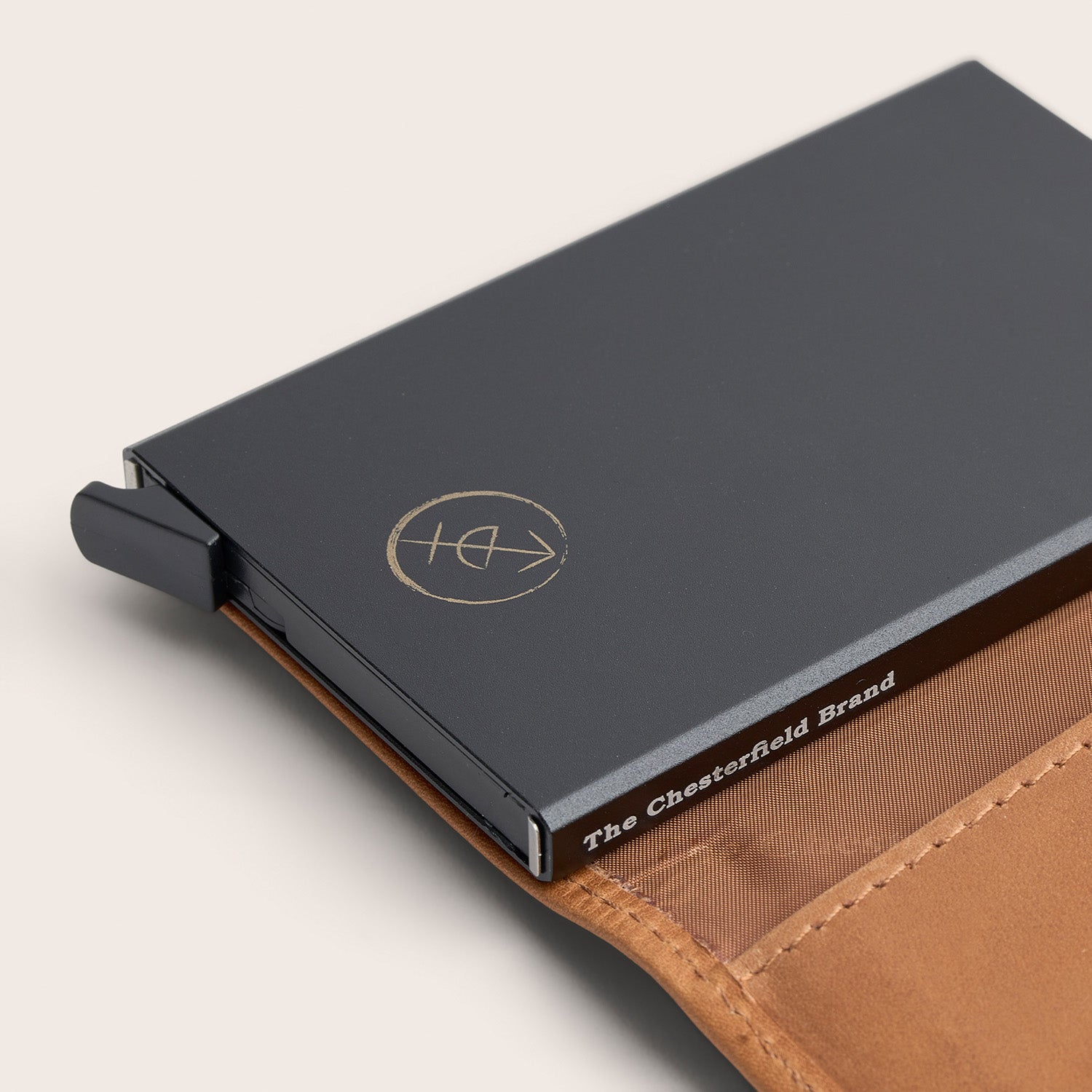 Leather Card Holder Cognac Lancaster, close-up of the card case with printed 'The Chesterfield Brand'