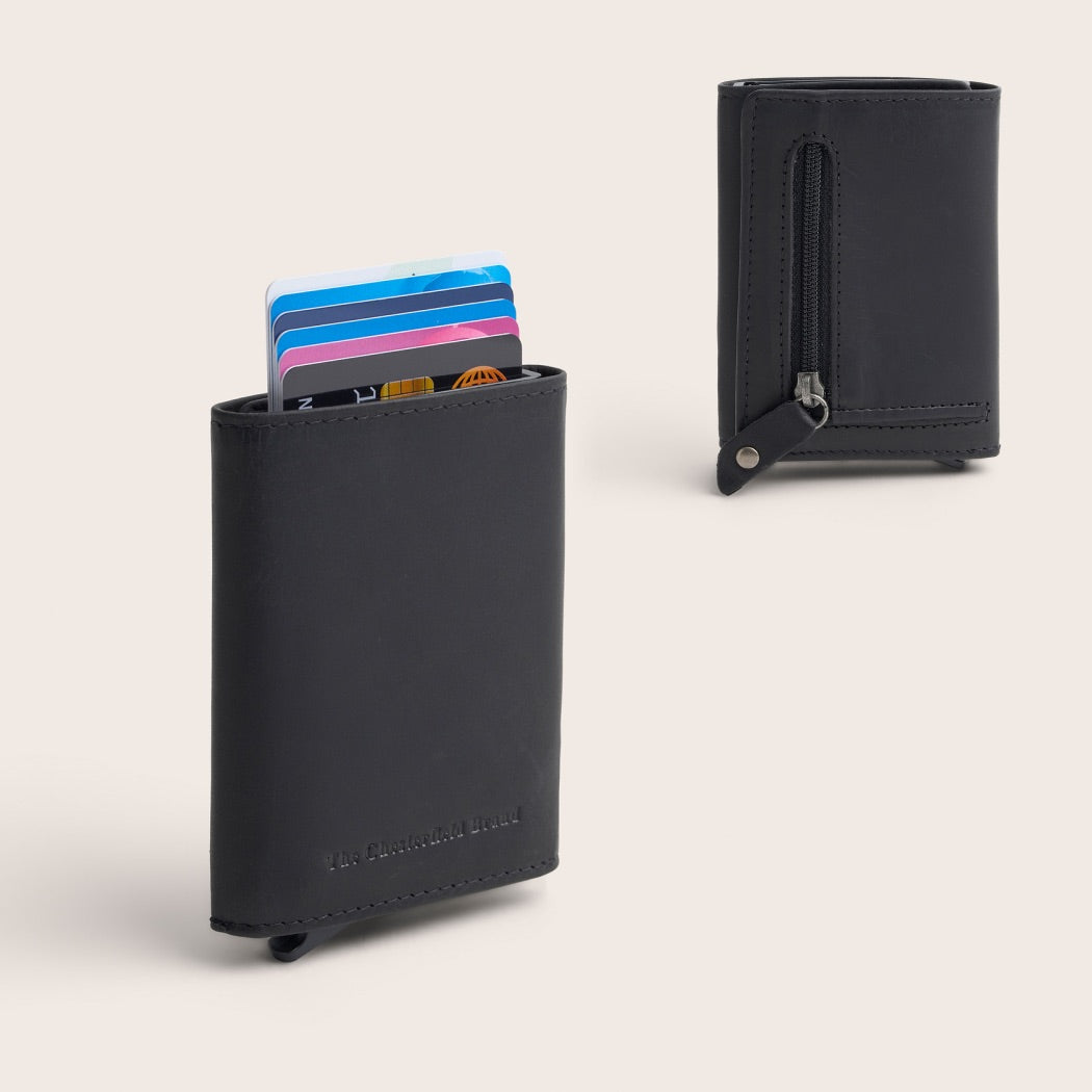 The Chesterfield Brand Leather Card Holder Black Palma, front view with cards pushed out and back view with zip pocket