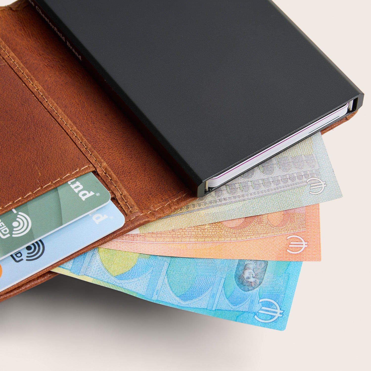Leather Card Holder Cognac Prague, with cards and banknotes