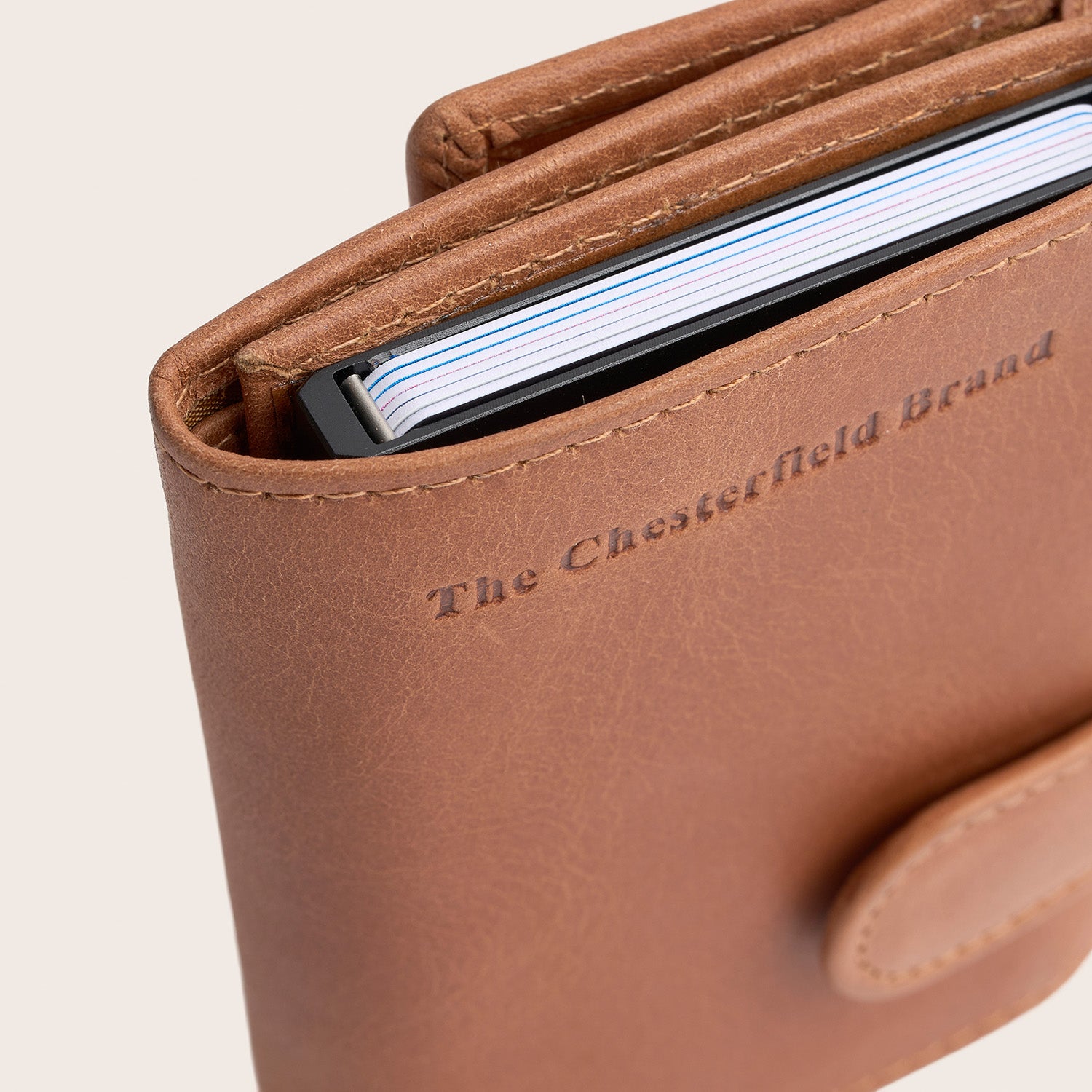 Leather Card Holder Cognac Frankfurt, close-up of the embossed logo 'The Chesterfield Brand'