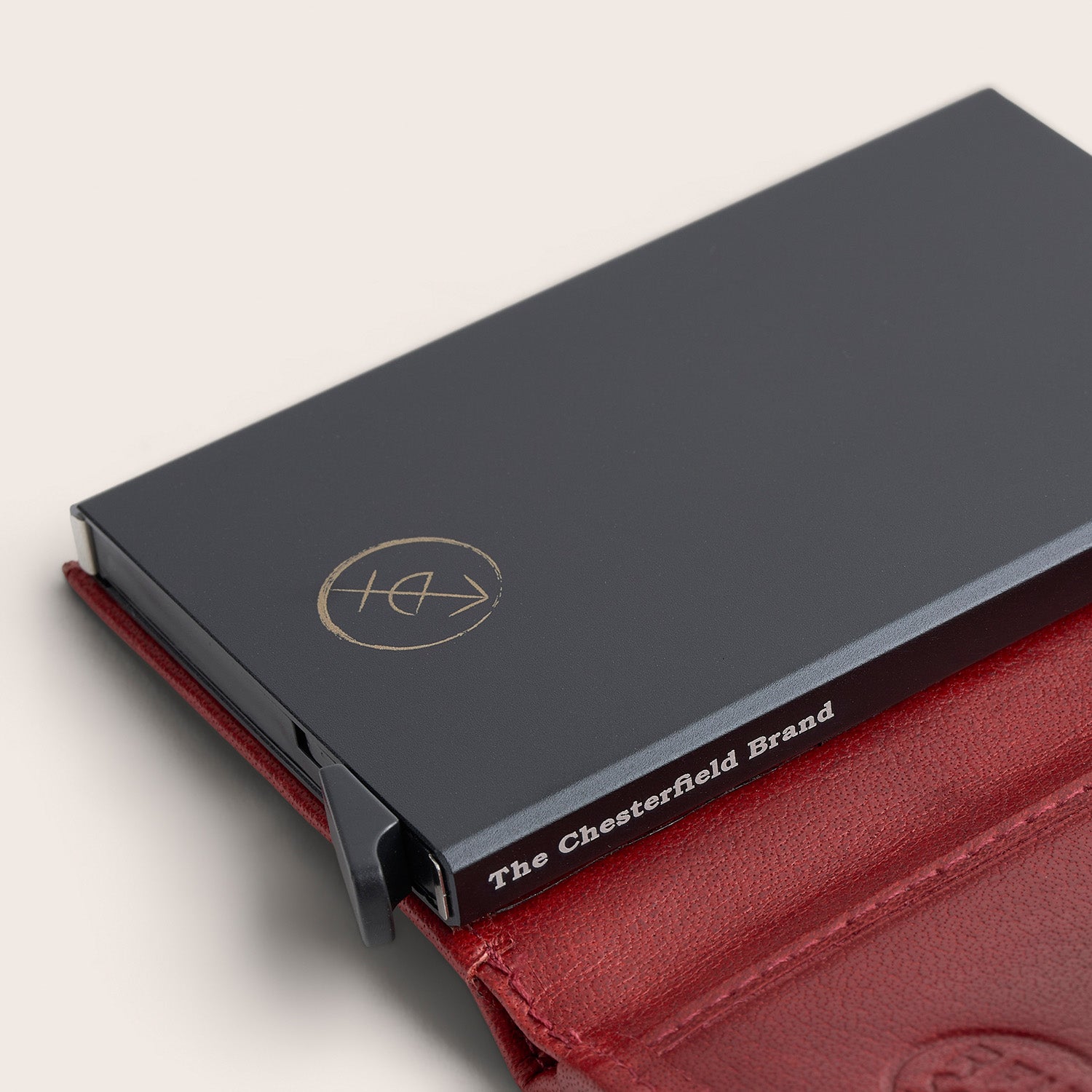 Leather Card Holder Red Hannover, close-up of the card case with 'The Chesterfield Brand' print