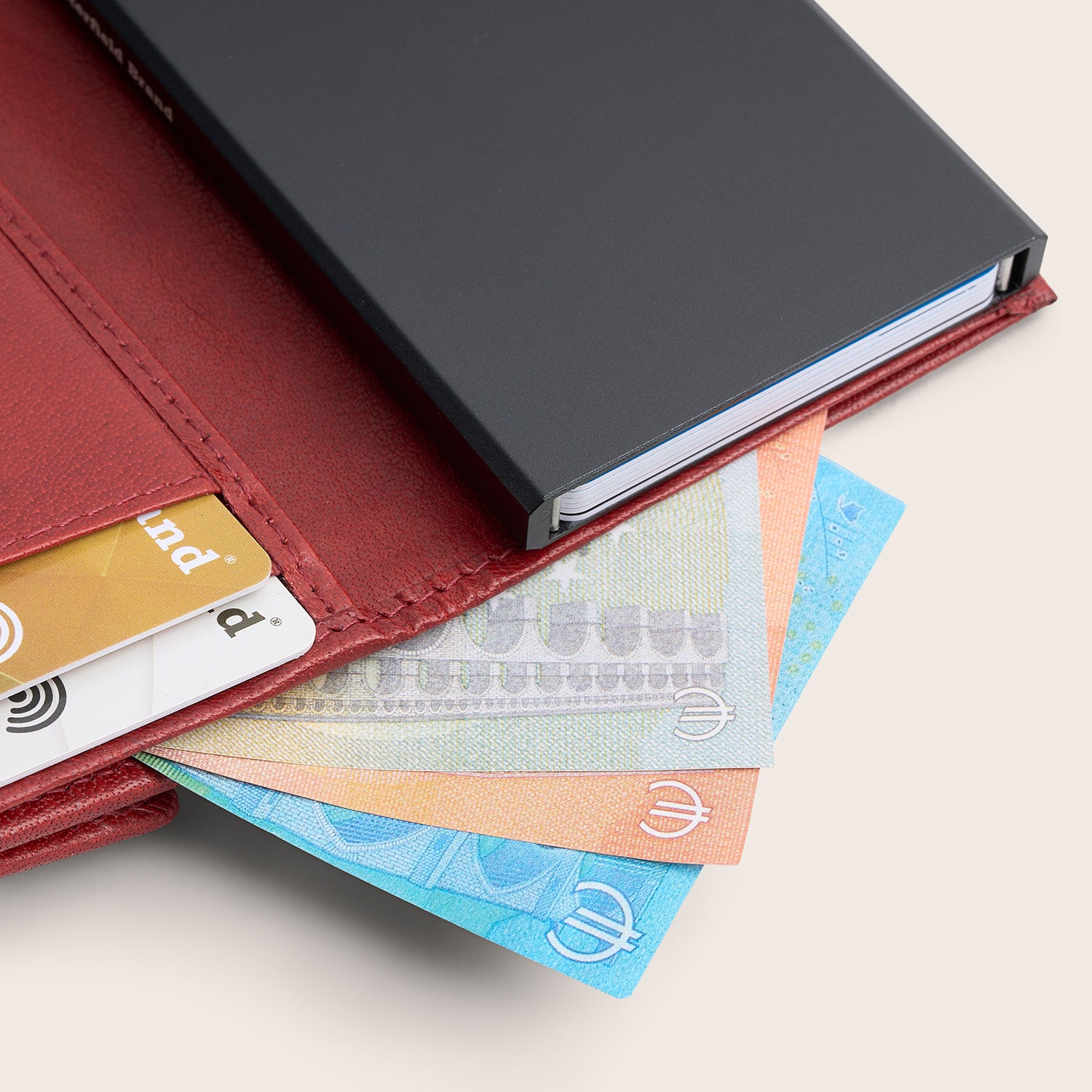 Leather Card Holder Red Hannover, inside view, with cards and banknotes