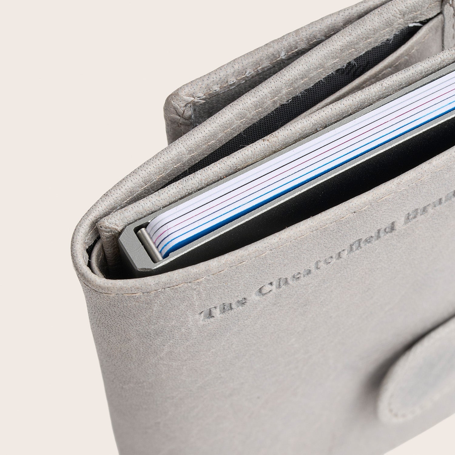 Leather Card Holder Light Grey Mannheim, close-up of the embossed logo and the card case