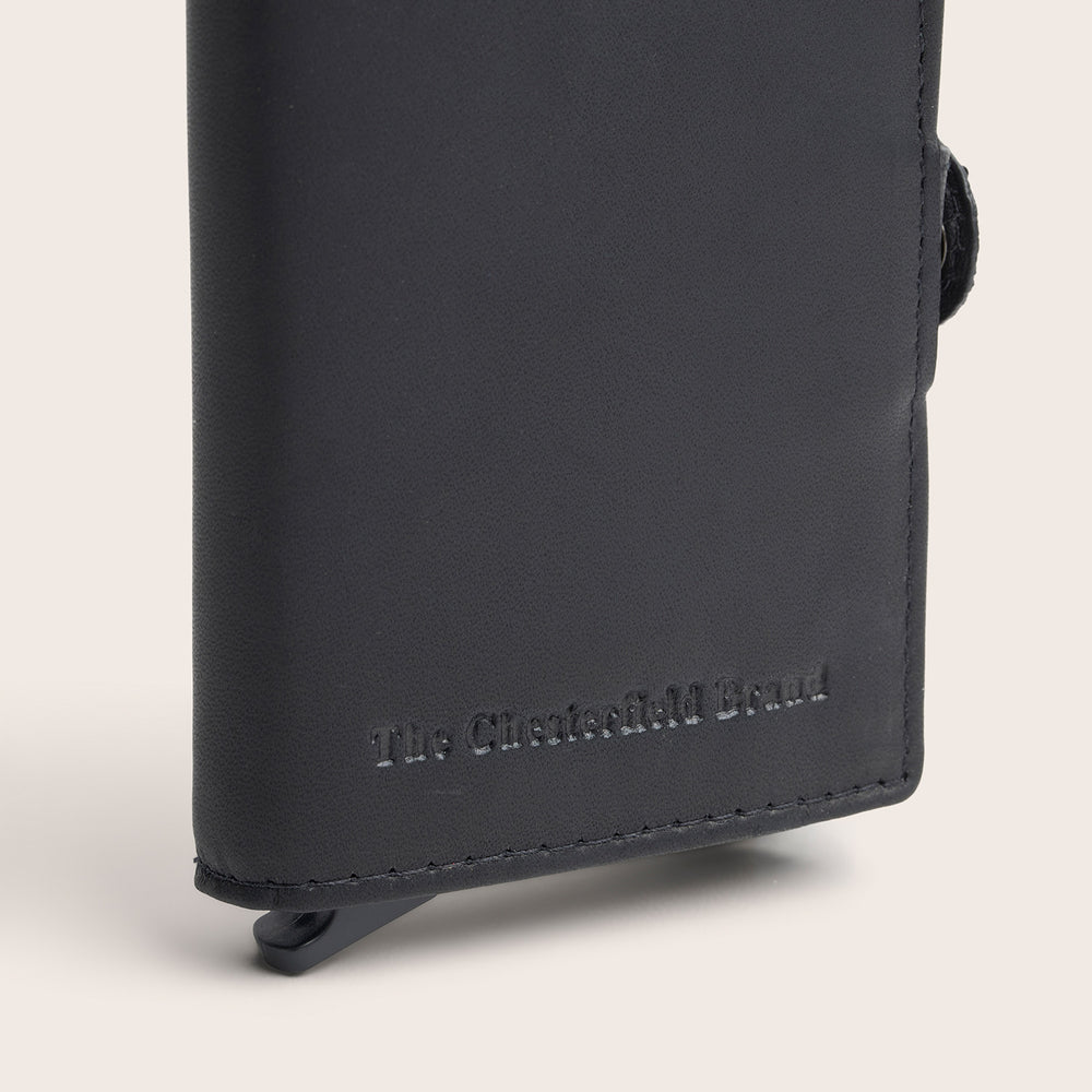 Leather Card Holder Black Lagos, close-up of the embossed logo