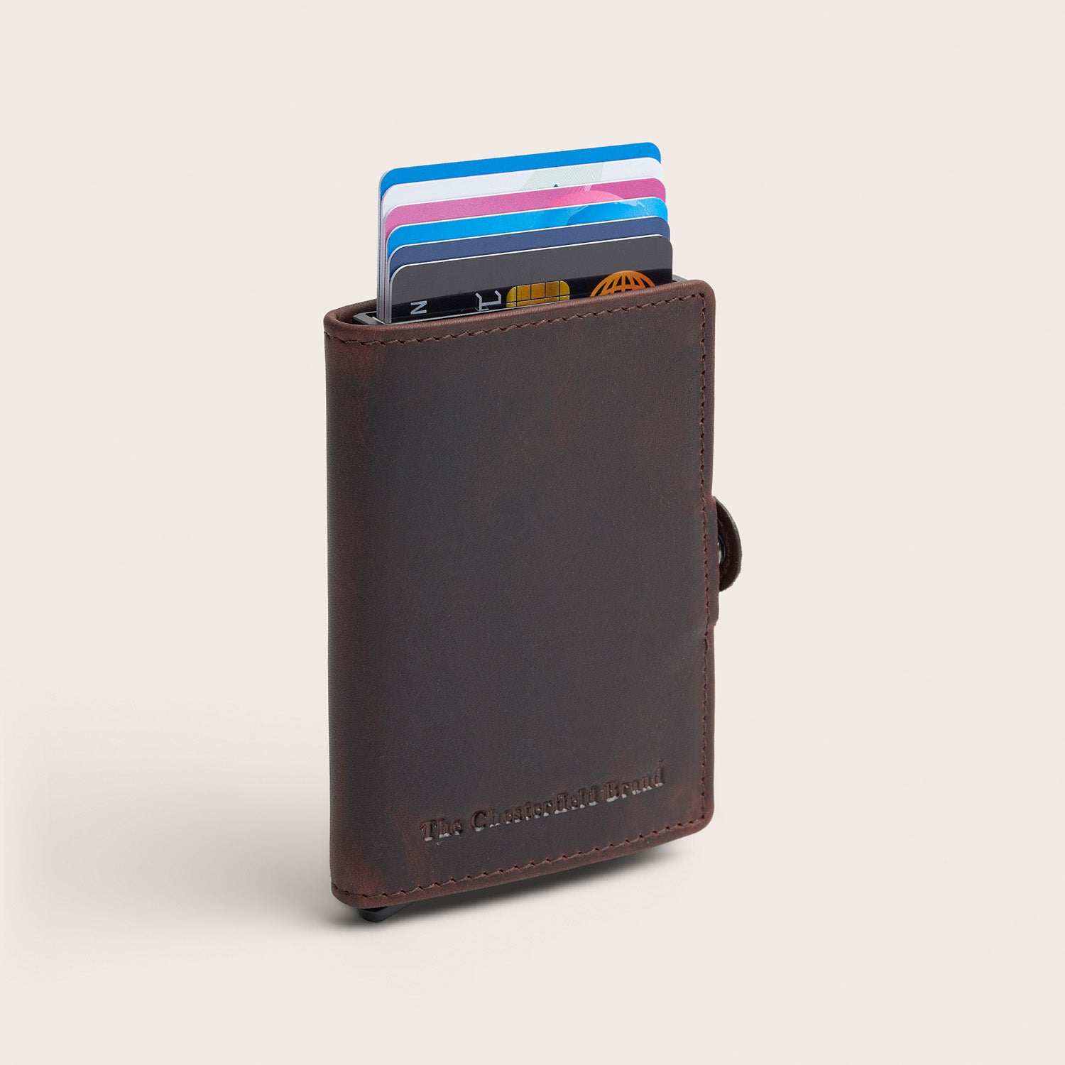 The Chesterfield Brand Leather Card Holder Brown Lagos, front view at an angle, with cards pushed out