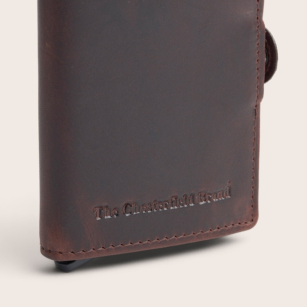 Leather Card Holder Brown Lagos, close-up of the embossed logo
