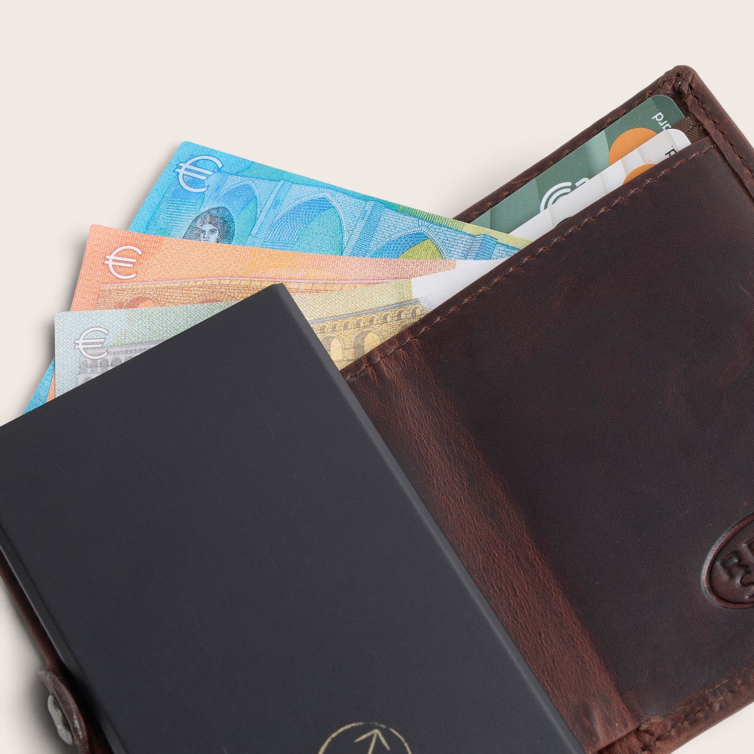 Leather Card Holder Brown Lagos, inside view, opened, with cards and banknotes