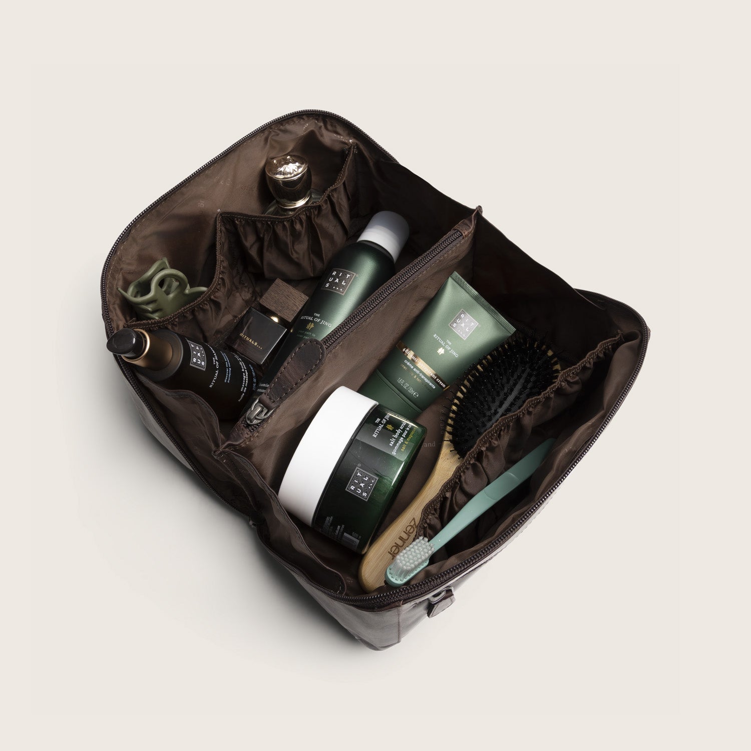 Leather Toiletry Bag Brown Elmia, top view, main compartment open, with toiletries