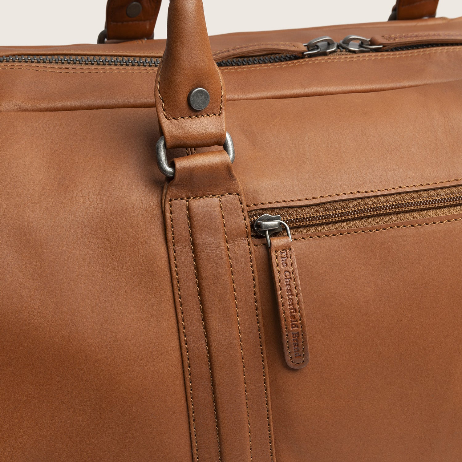 Leather Weekender Bag Cognac Melbourne, close-up of a zip pocket