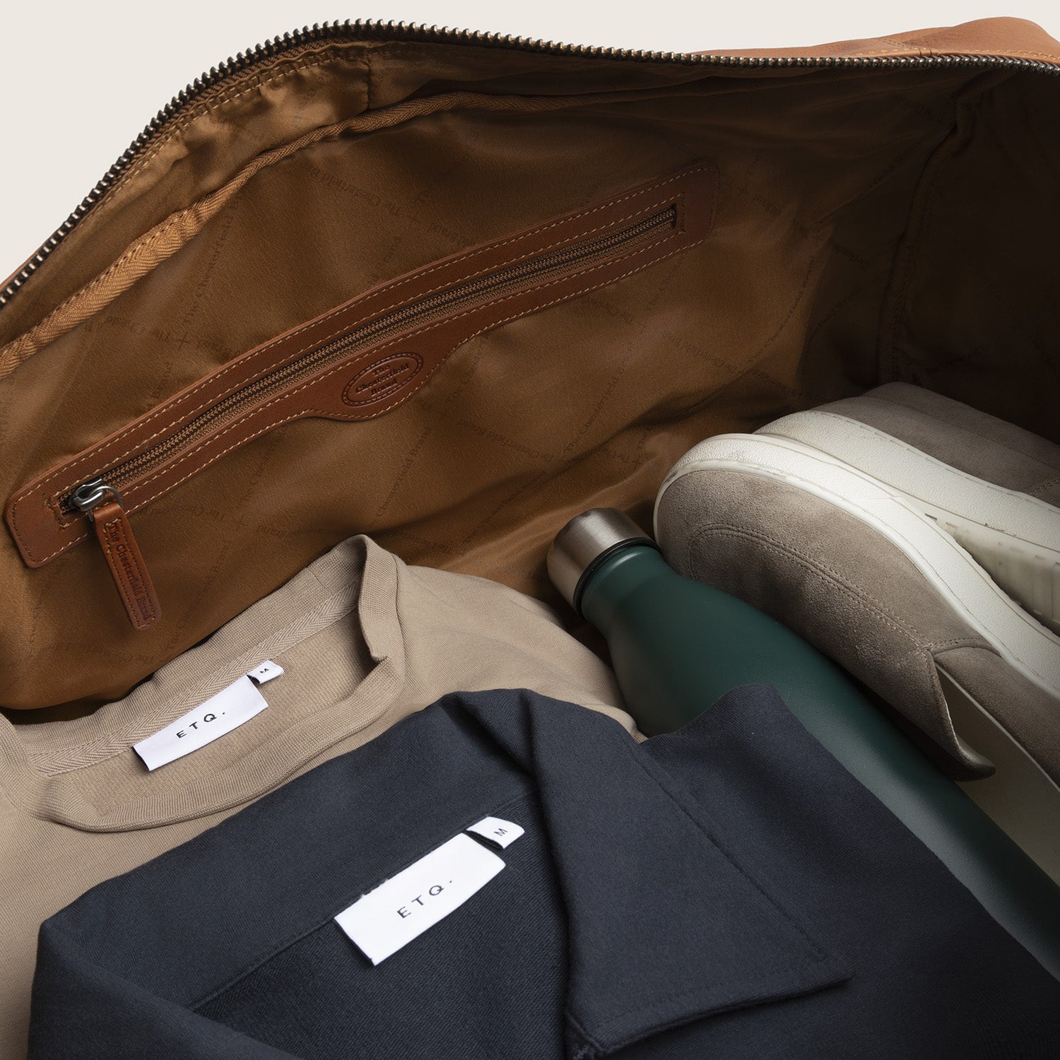 Leather Weekender Bag Cognac Melbourne, inside view with zip pocket