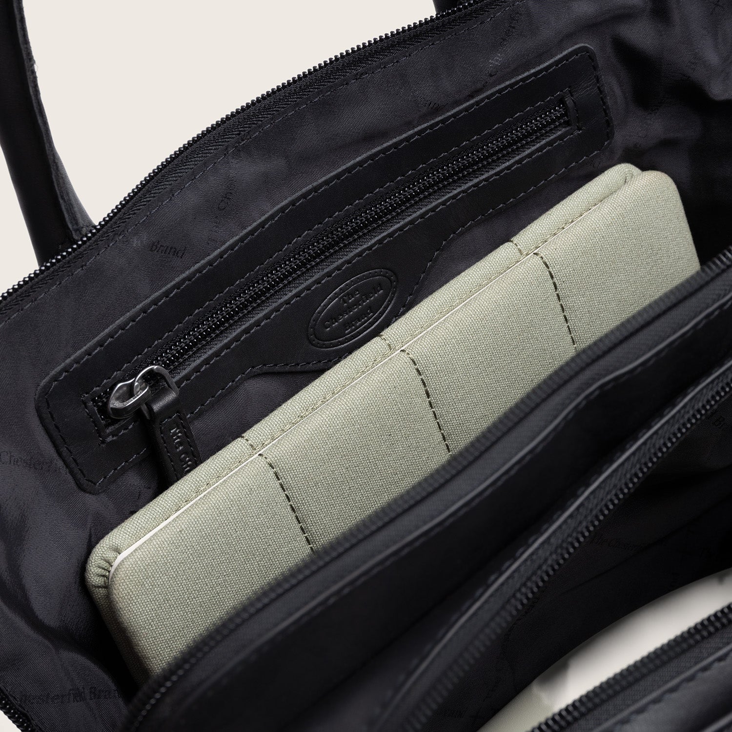 Leather Handbag Black Layton, inside view with an inner zip pocket
