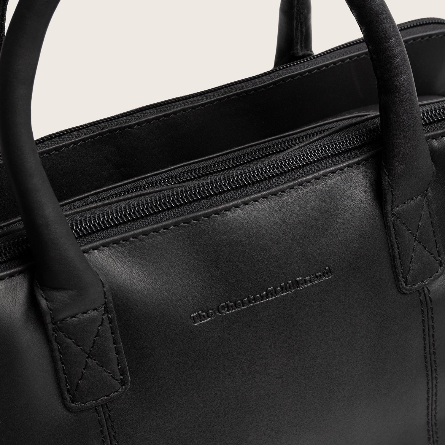 Leather Handbag Black Layton, close-up of the embossed logo
