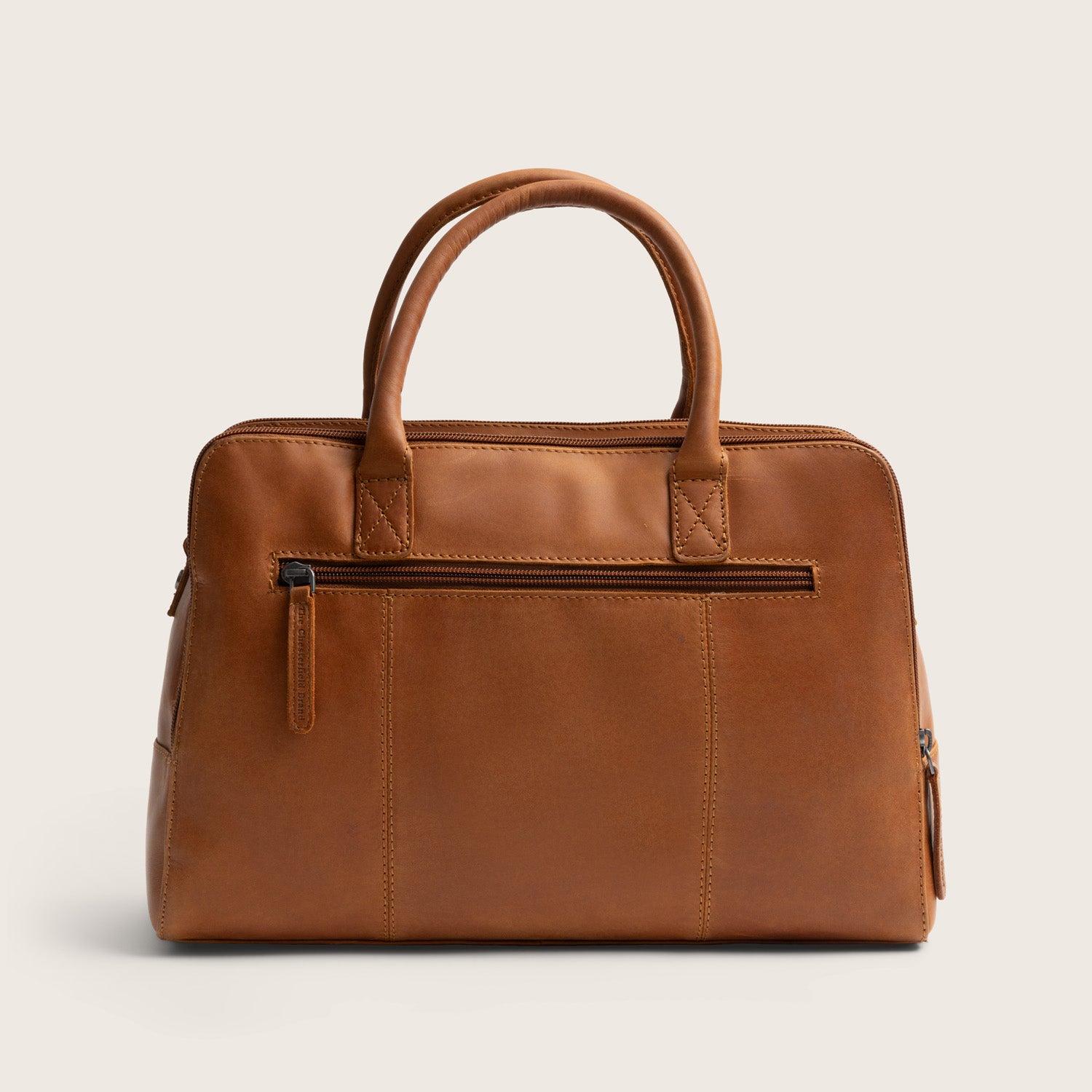 Leather Handbag Cognac Layton, back view with a zip pocket