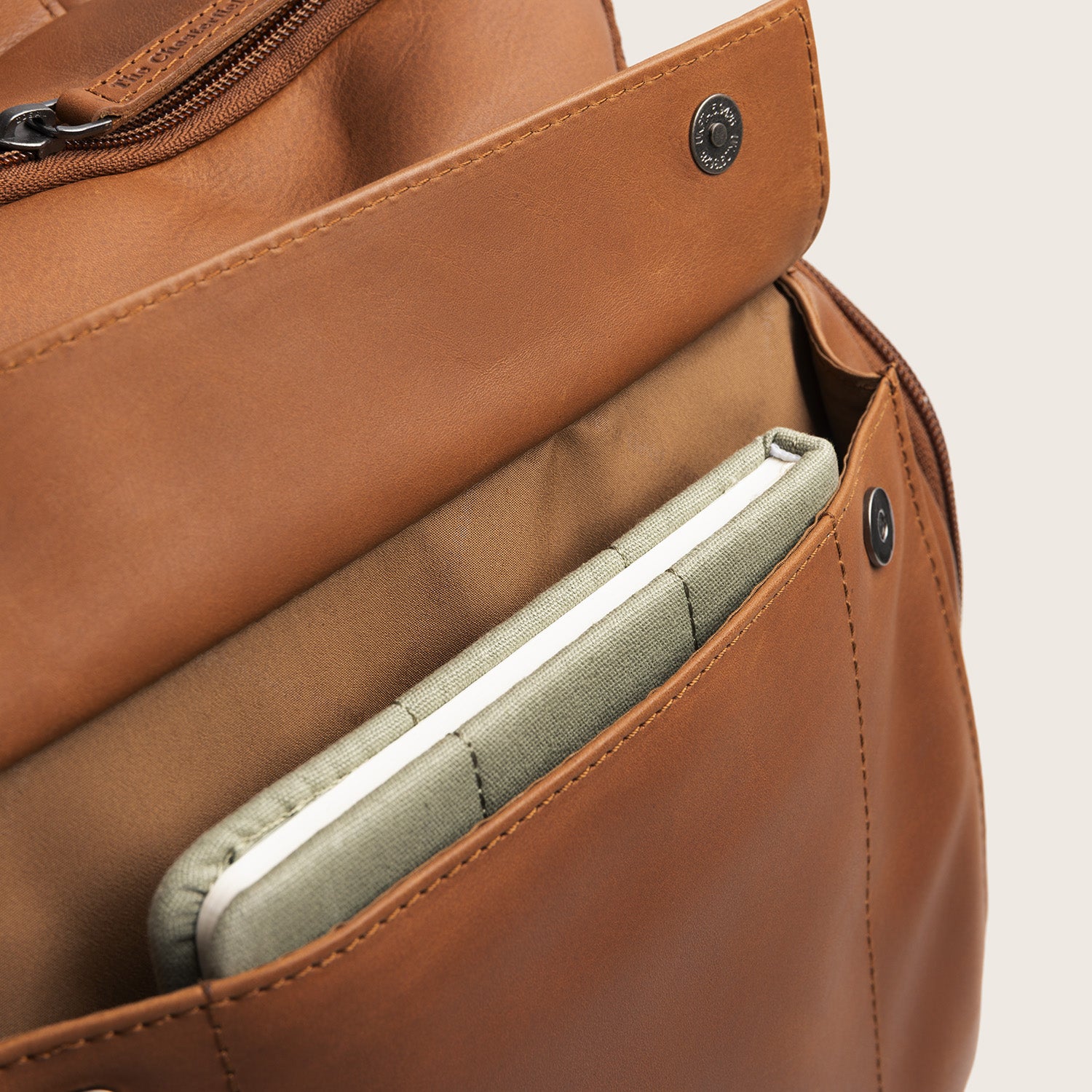 Leather Laptop Backpack Cognac Rich, front pocket with the flap open