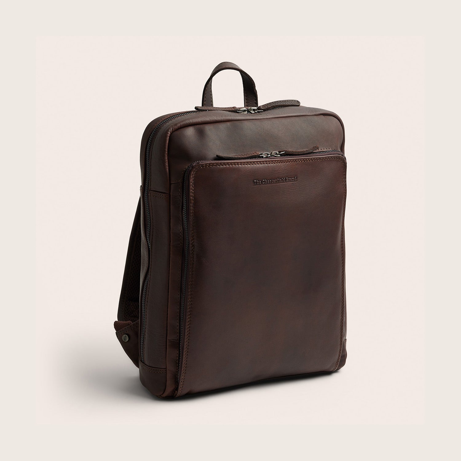 The Chesterfield Brand Leather Laptop Backpack Brown Jasper, front view at an angle